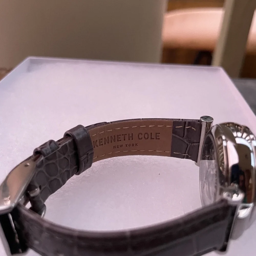 Vintage Kenneth Cole Women's Skeleton water resistant gray leather band Watch